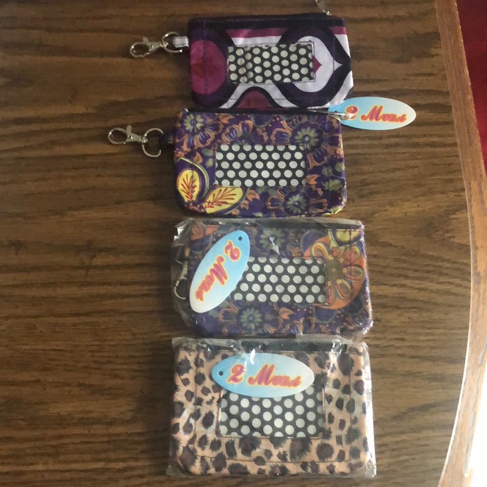 Bundle of four vinyl keychain mini wallets - new